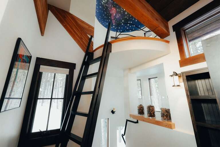 Access the home`s starlit turret to enjoy a cozy, magical space | Upper Level